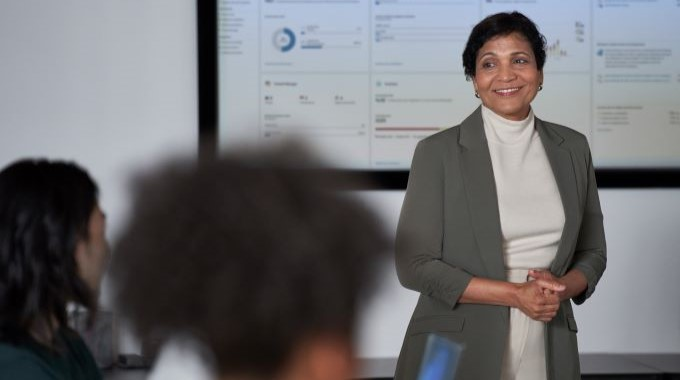 Woman presenting during a meeting