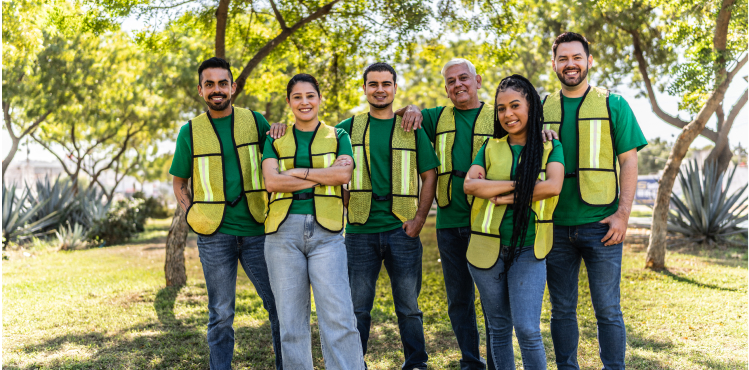 A group of volunteers stands together