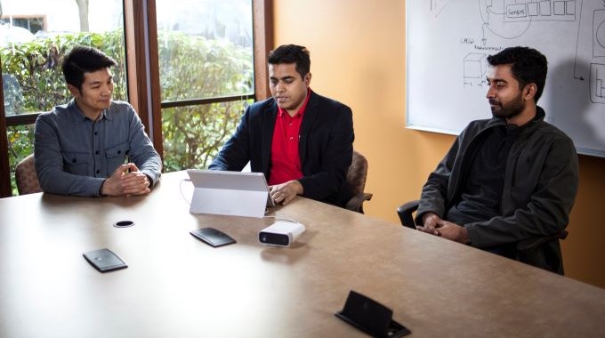 Group working on one computer