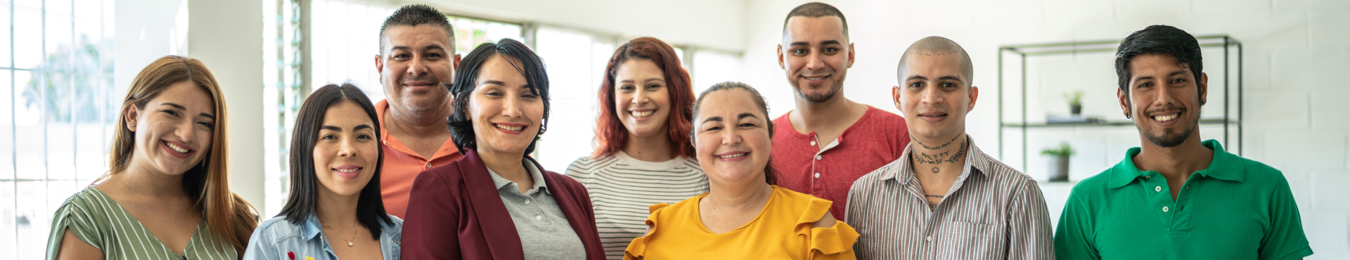 A group of nonprofit employees stands together